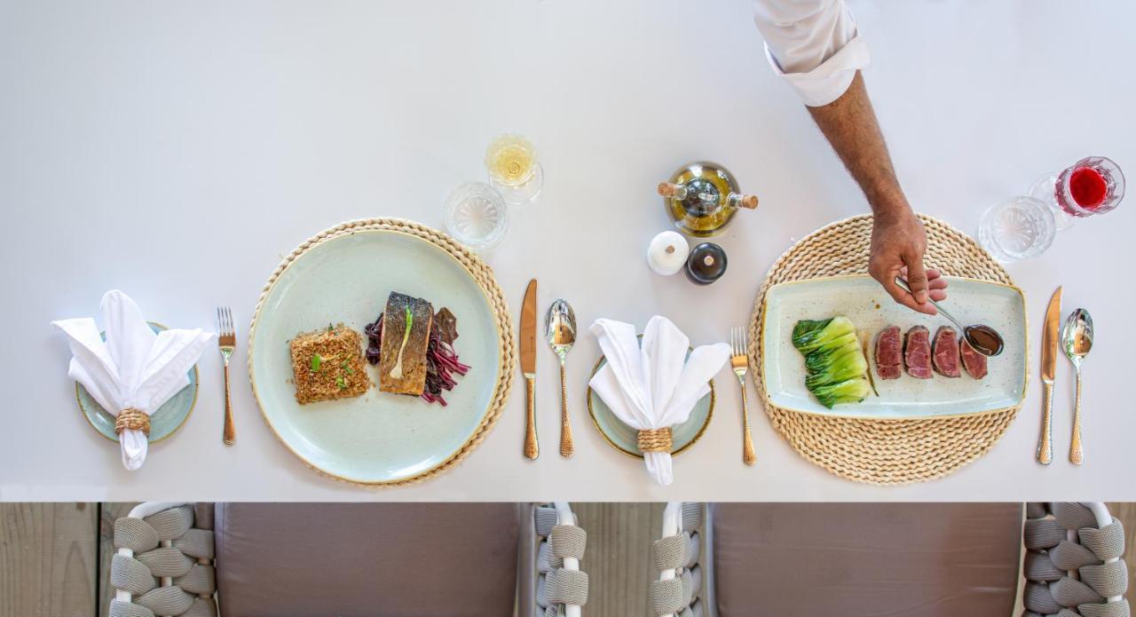 Malahini Kuda Bandos Resort Hulhumale Exterior photo A place setting