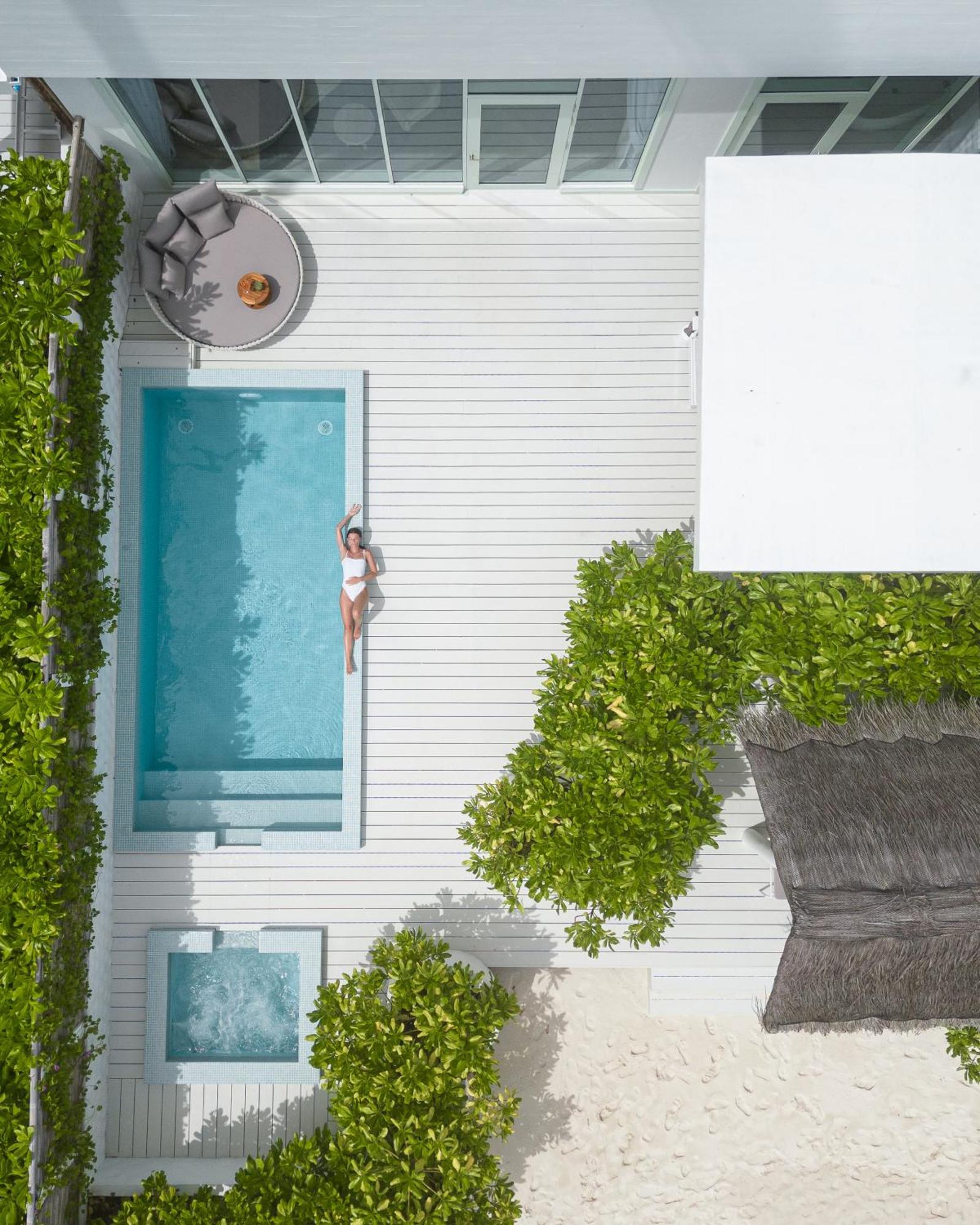 Malahini Kuda Bandos Resort Hulhumale Exterior photo Aerial view of a pool